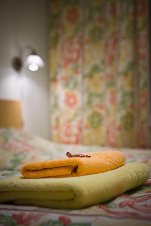 Postel nebo postele na pokoji v ubytování Posti Hostel
