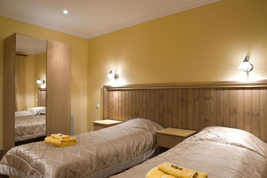 Postel nebo postele na pokoji v ubytování Posti Hostel