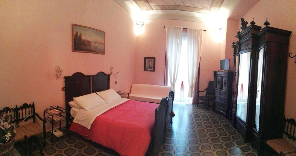 Postel nebo postele na pokoji v ubytování Domus Cicerone