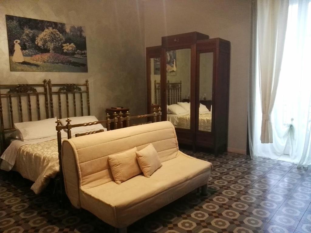 Postel nebo postele na pokoji v ubytování Domus Cicerone