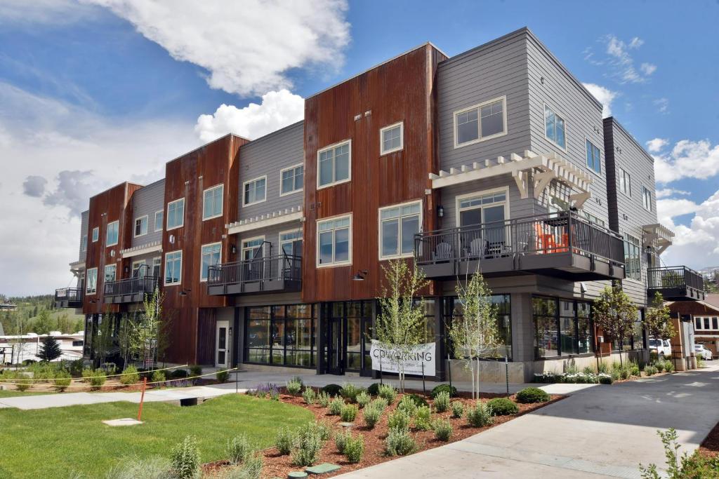 an image of an apartment building at Downtown WP Loft 14 I Huge Hot Tub I Great Views I Additional Bunk Area I Activity Program in Winter Park