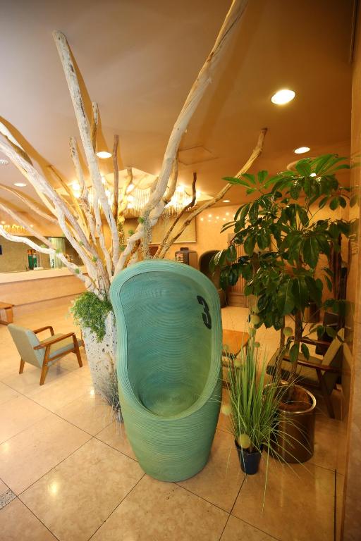 Posezení v ubytování Apoa Hotel