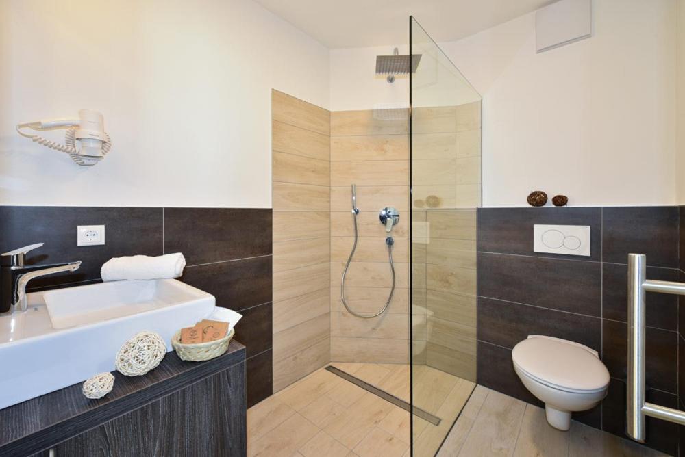 Koupelna v ubytování Hotel Tyrol Plose