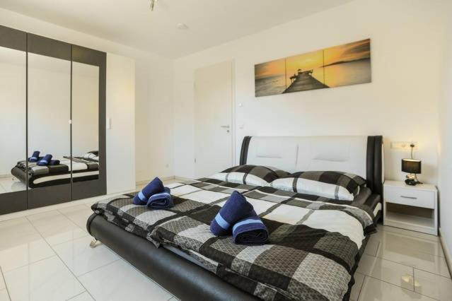 Postel nebo postele na pokoji v ubytování Design Apartment Metzingen