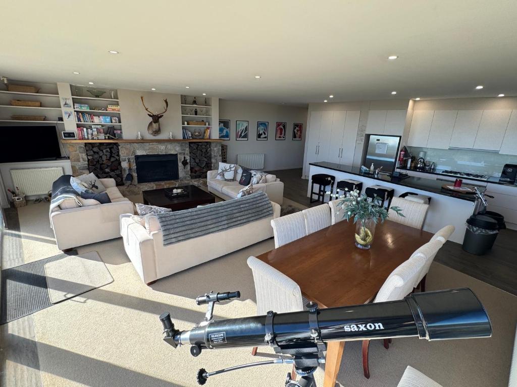 a view of a living room with a table and chairs at Mark II 3W in Mount Buller