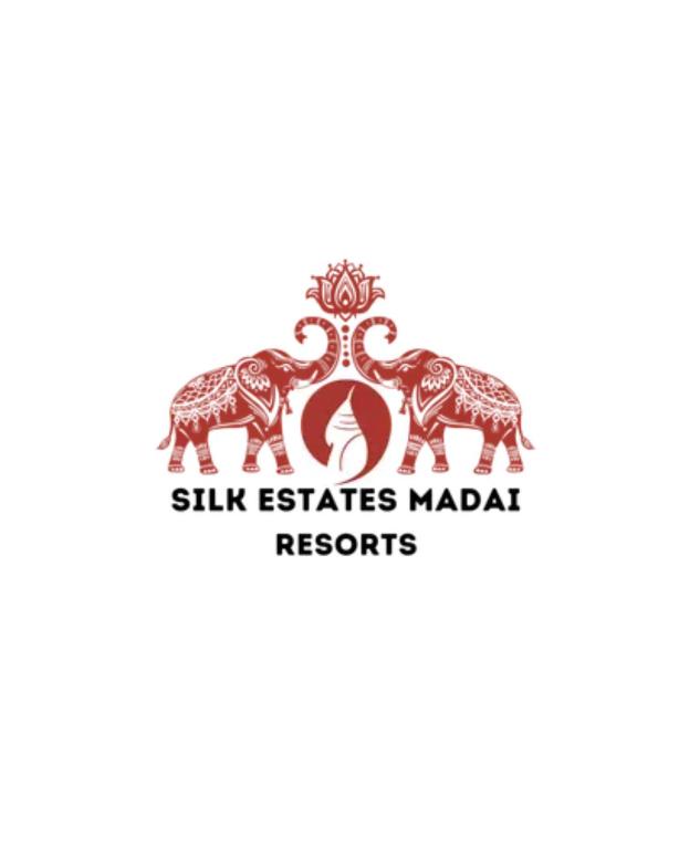 a logo for silk estates madhubani resorts at Silk Estates Madai in Khāpa