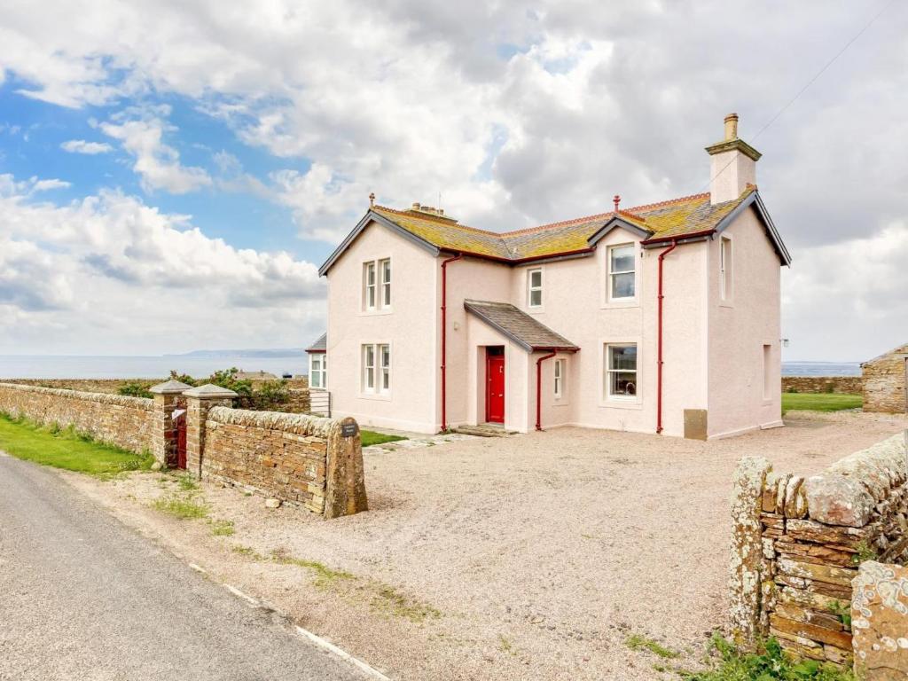 a house on the side of a road at 3 Bed in Thurso oc-ca337 in Mey