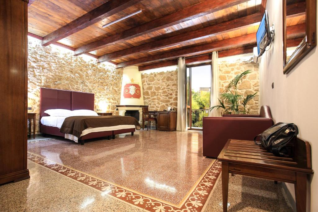 Postel nebo postele na pokoji v ubytování Bienestar - Maison de Charme
