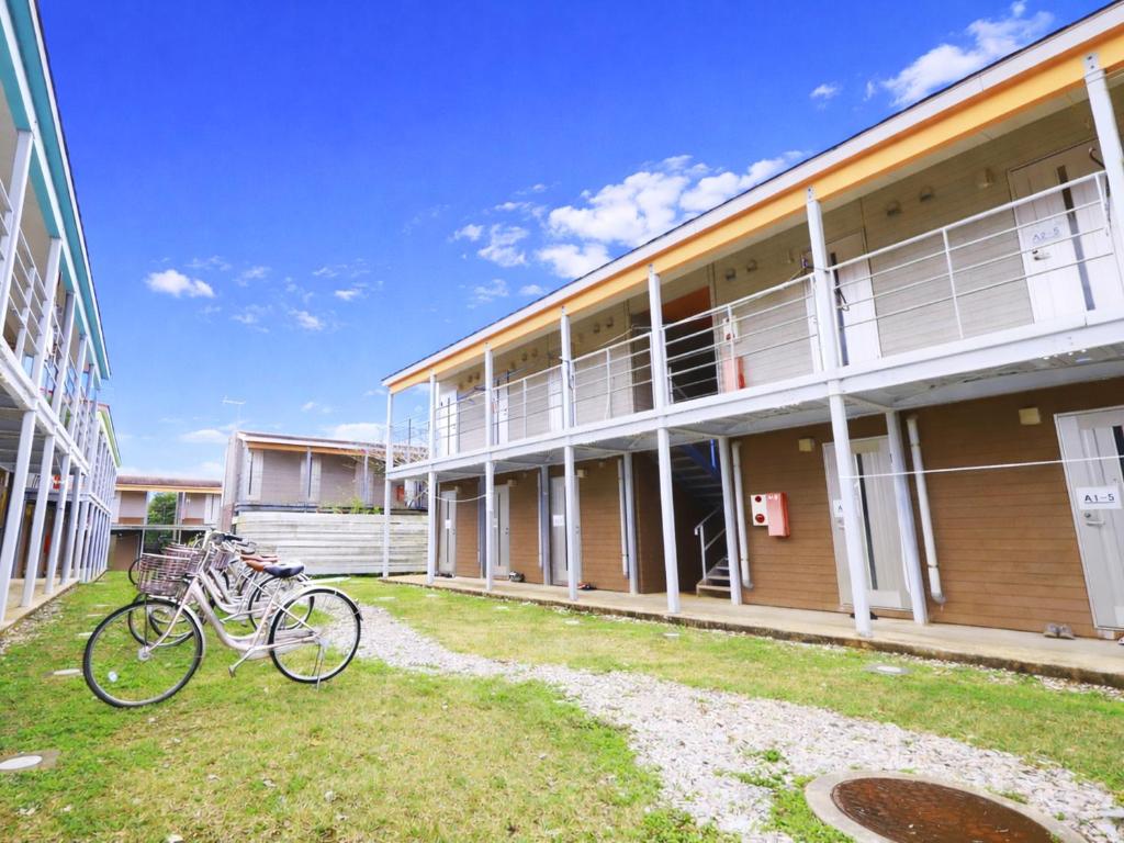 a bike parked in front of a building at House&Cafe GreenTerrace in Ishigaki Island