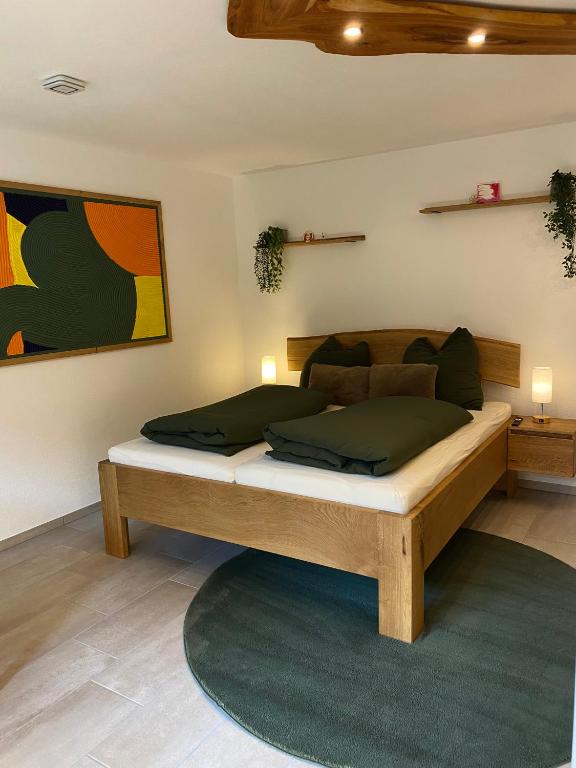 a bedroom with a bed in a room at Stübchen Nr 37 in Inzigkofen