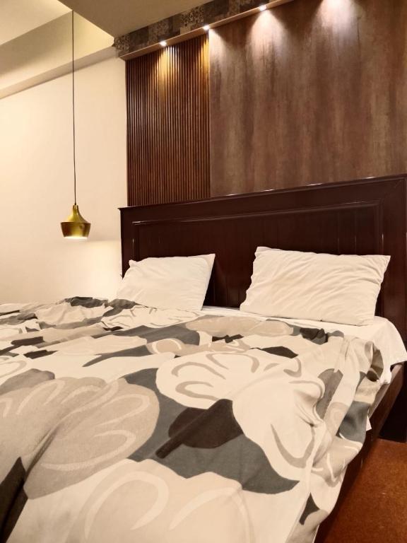 Sina Lodges and Guest house - Deluxe Kamer Met Kingsize Bed