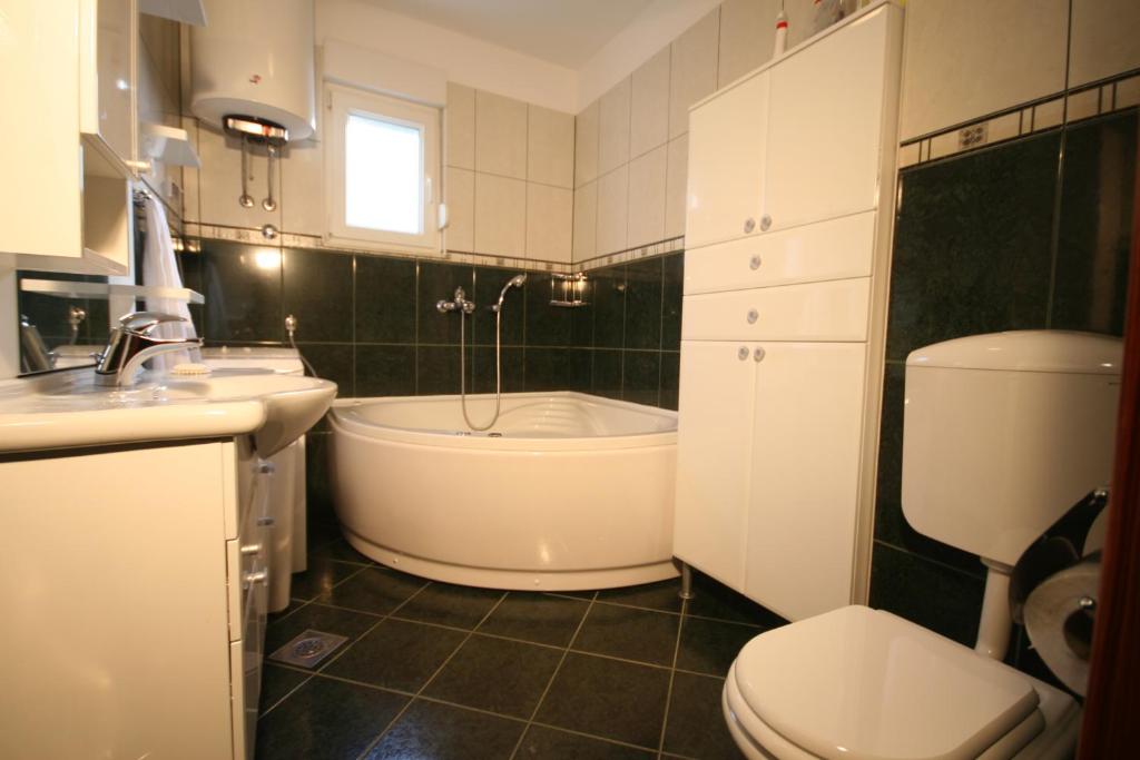 Kúpeľňa v ubytovaní Apartments Beverly