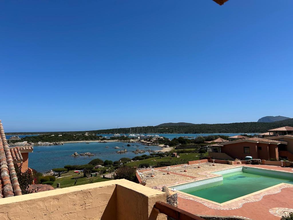 a view of a body of water from a building at Casa Vacanza con Piscina e Accesso diretto al Mare in Santa Marinella
