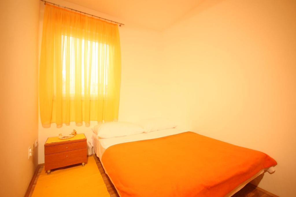 Posteľ alebo postele v izbe v ubytovaní Apartments Beverly