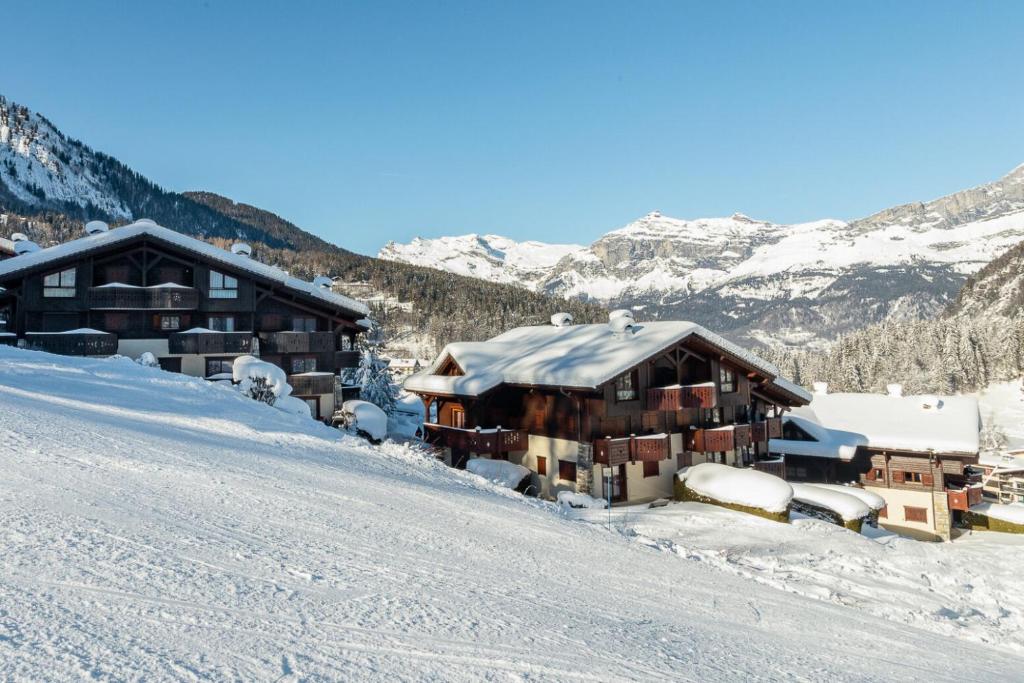 a ski lodge in the mountains with snow at Apartment Refuge de Bellachat, Alpes Agency, Les Houches, Sleeps 4 in Les Houches