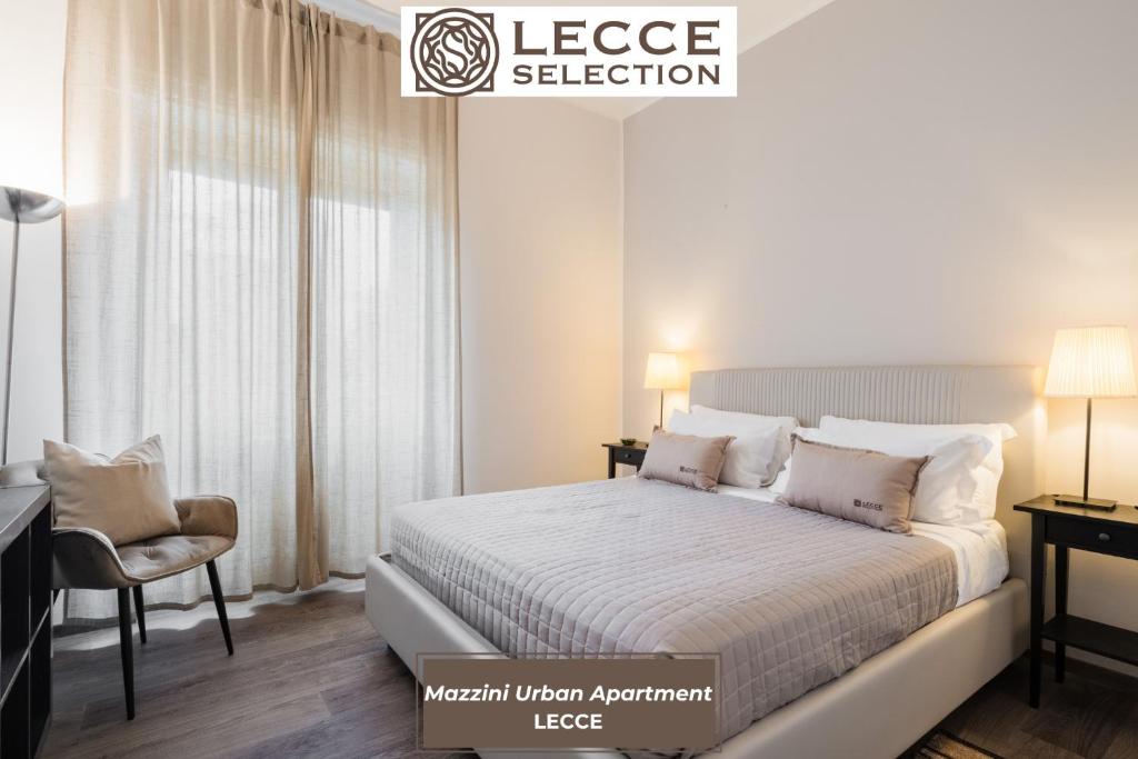a bedroom with a bed and a desk and a chair at Mazzini Urban Apartment - Lecce Selection in Lecce