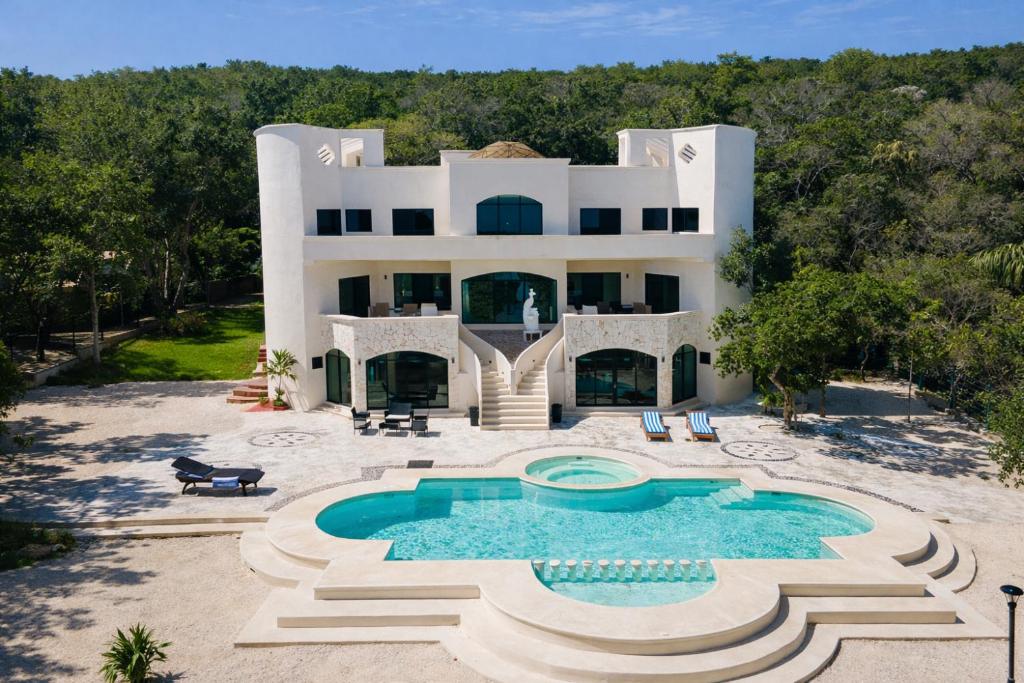 an aerial view of a house with a swimming pool at CISNE Luxury House in Xetna