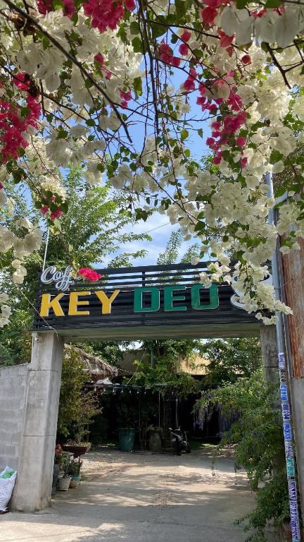 a sign that says key idea with flowers at KEYDEO House in Phan Thiet