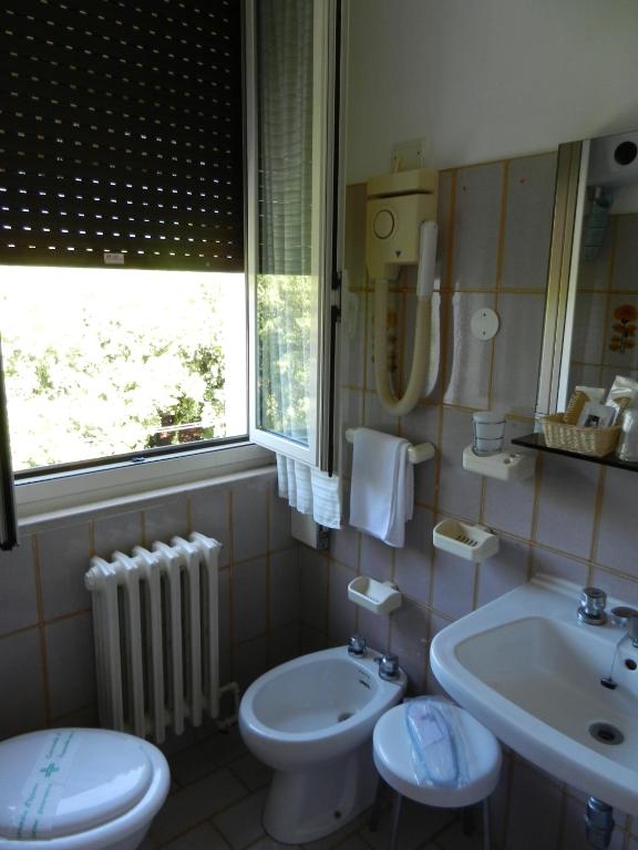 Koupelna v ubytování Hotel Paradiso
