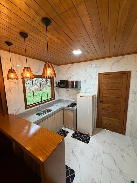 Dapur atau dapur kecil di Pousada Buzato