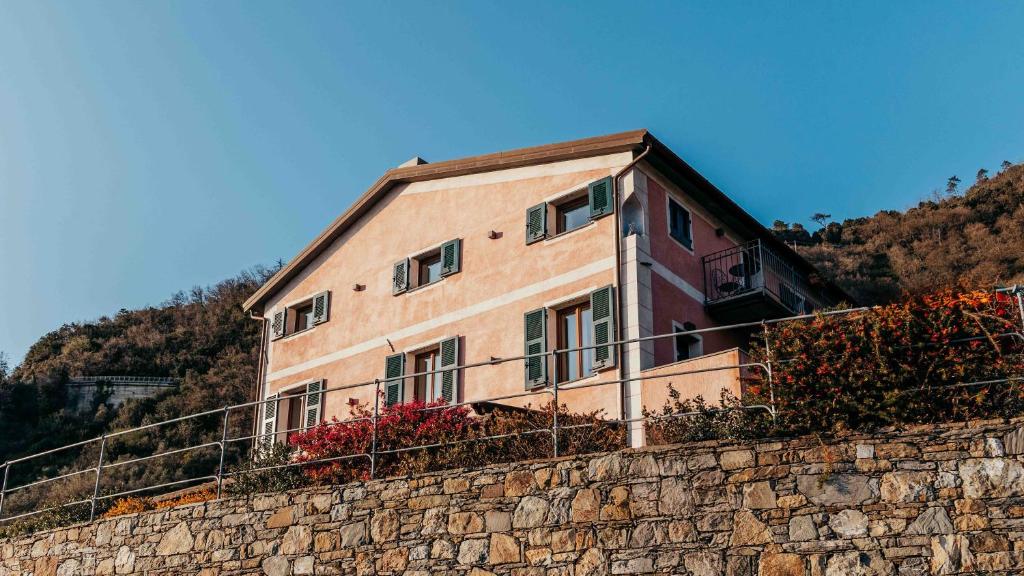 a building on top of a stone wall at Agriturismo Missanega in Monterosso al Mare