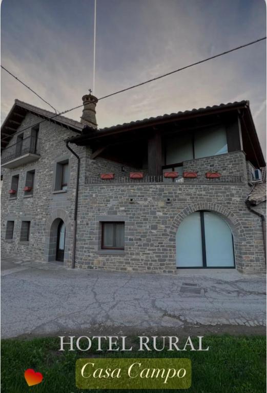a hotel rival casa camino with a brick building at HOTEL RURAL Casa Campo in Abay