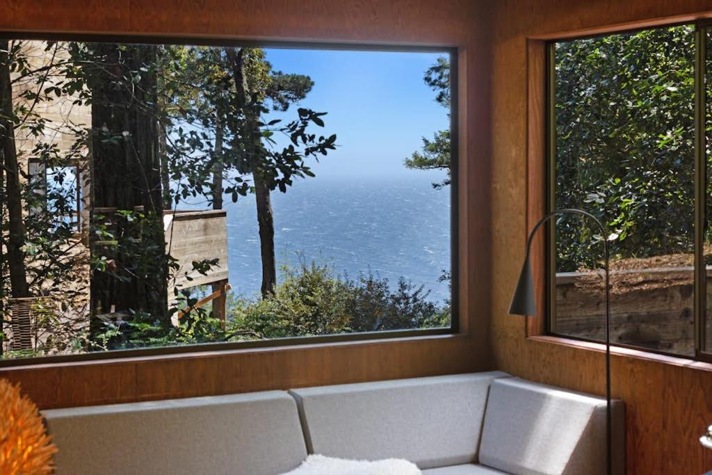 a view of the ocean from a window at Cabin 55 in Sea Ranch