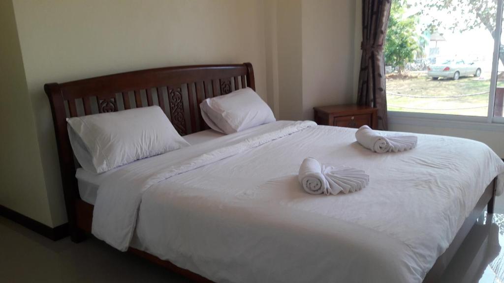 Postel nebo postele na pokoji v ubytování Lomtalay Resort Trat