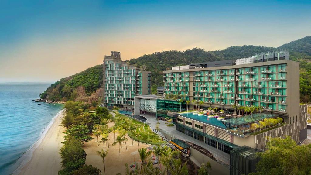 an aerial view of a hotel and a beach at Angsana Teluk Bahang, Penang in Batu Ferringhi