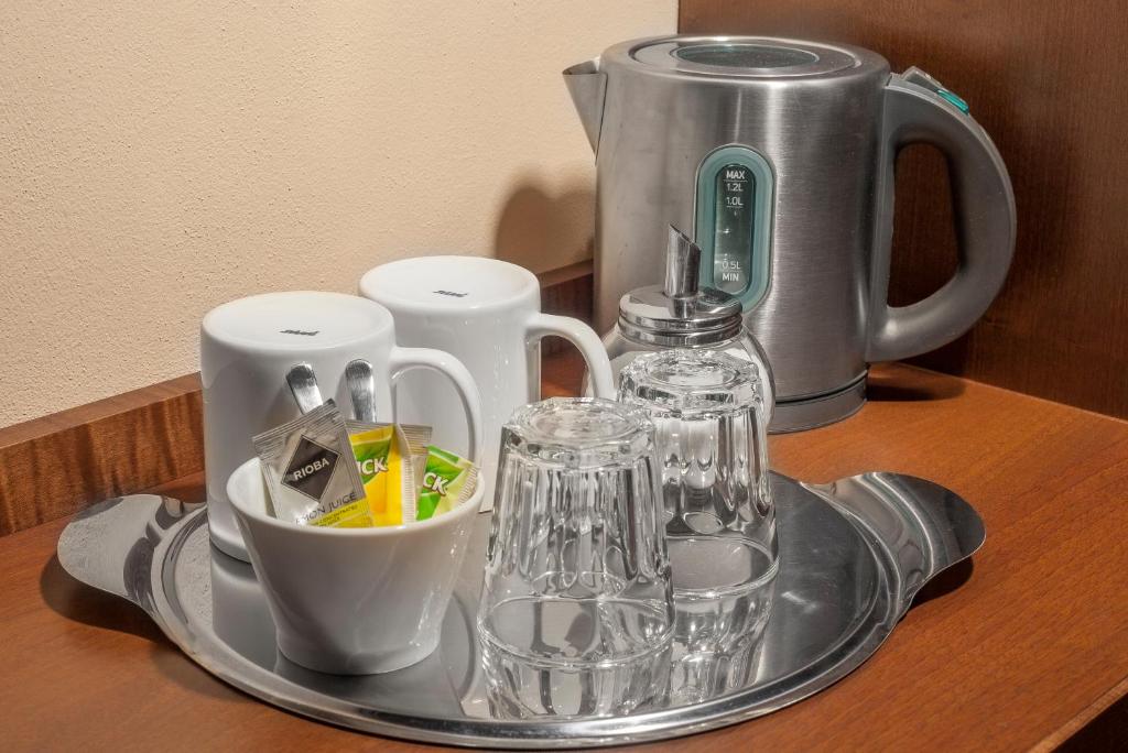 Příslušenství pro přípravu čaje a kávy v ubytování Hotel Tetřeví Boudy