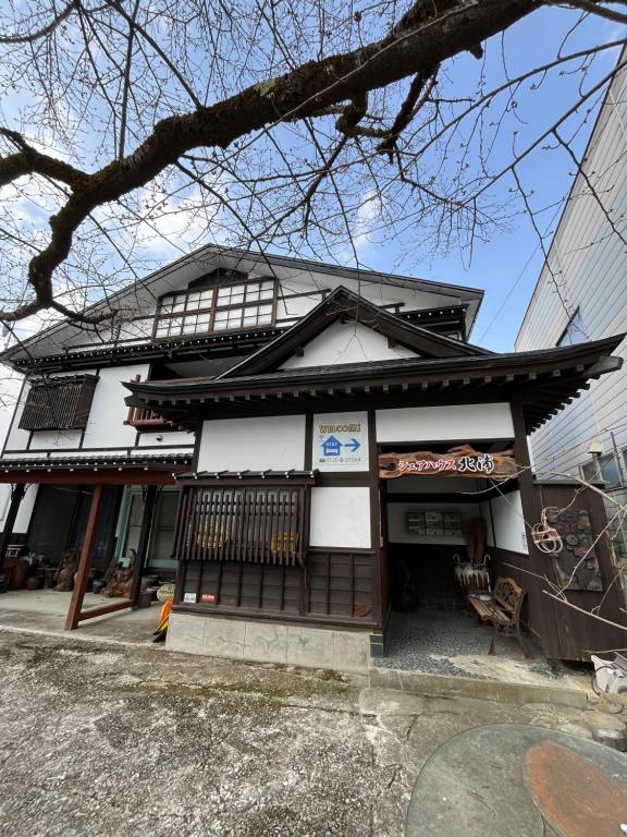 an asian building with at 民泊 シェアハウス北浦 in Senboku