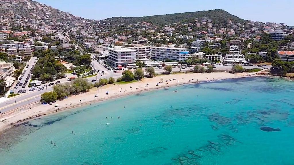 an aerial view of a beach and a city at Beachfront Apprtment on Athens Riviera in Saronida