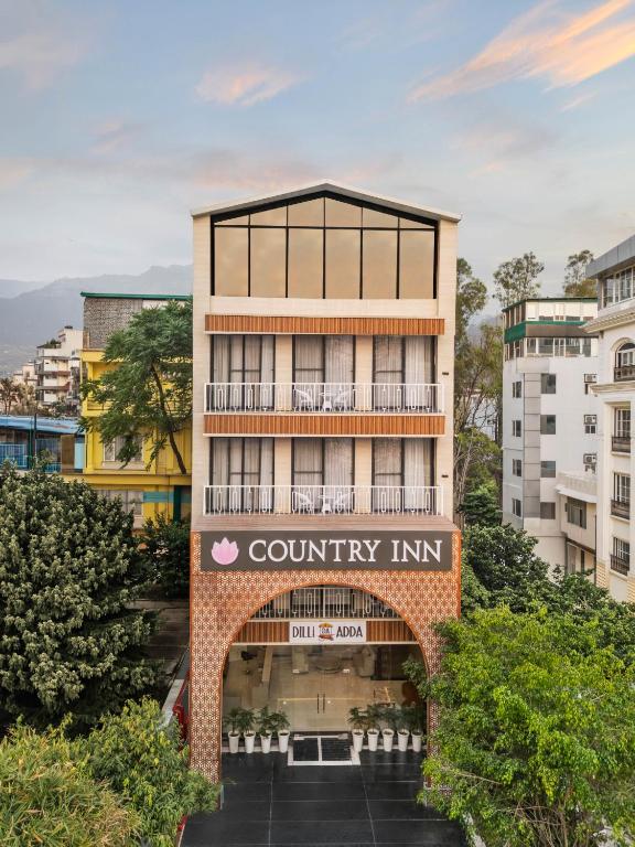 an external view of a building with a country inn at Country Inn Rishikesh at Laxman Jhula in Rishīkesh
