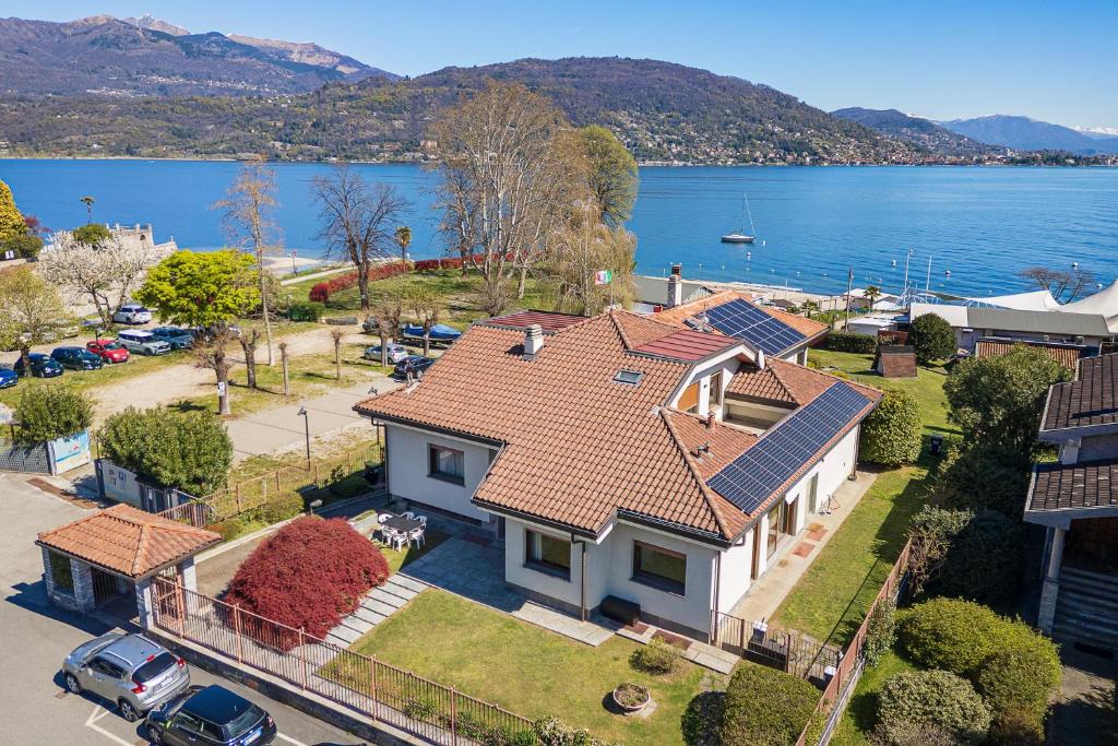 an aerial view of a house with a lake at Baveno Beach - Charming Flat With Garden in Baveno