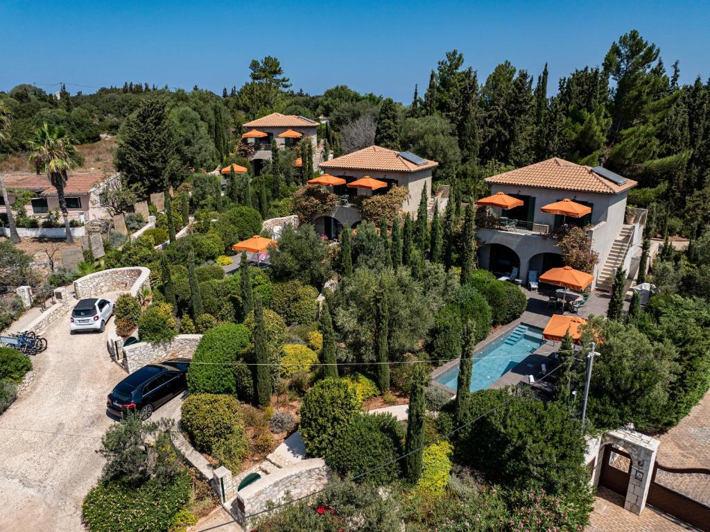 an aerial view of a house with a pool at North Point Houses in Fiskardo