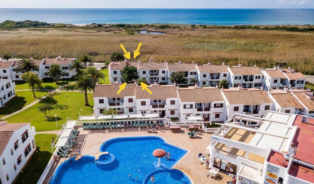 an aerial view of a resort with a swimming pool at Mar & Calma in Son Bou