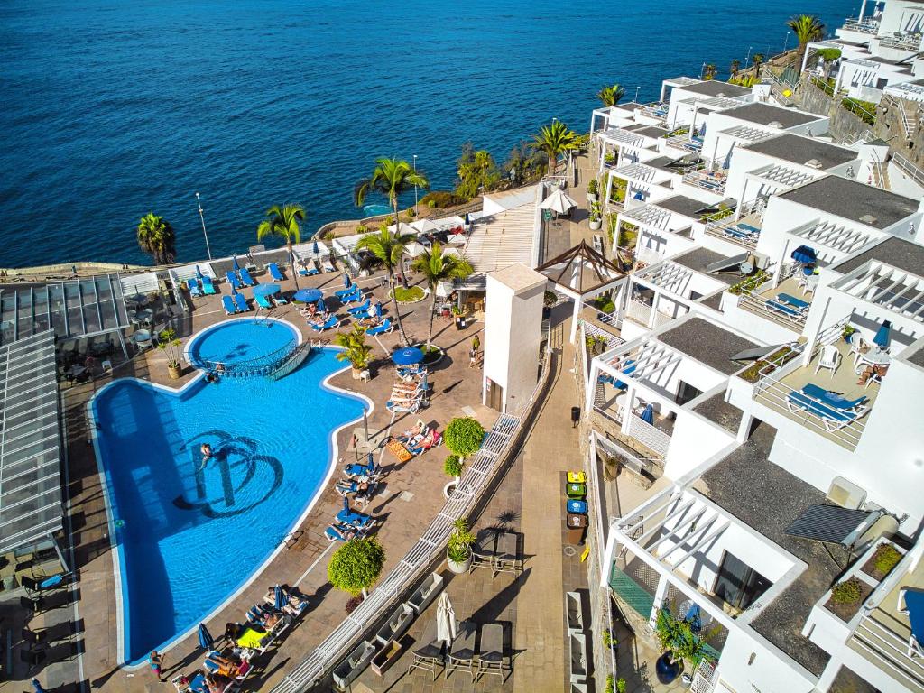 an aerial view of a resort with a swimming pool at Bahia Blanca in Puerto Rico de Gran Canaria