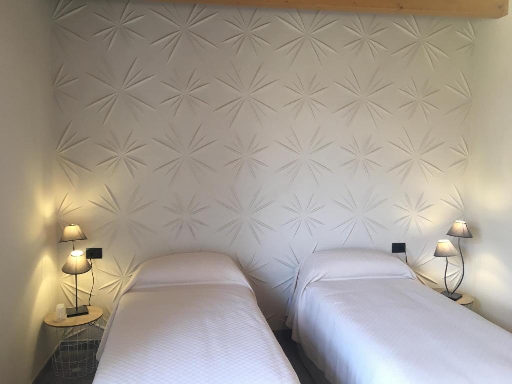 Postel nebo postele na pokoji v ubytování Agriturismo da Mamma