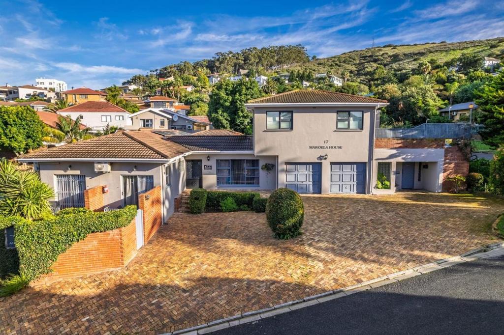 an image of a house with a mountain in the background at Maroela House Guest Accommodation in Bellville