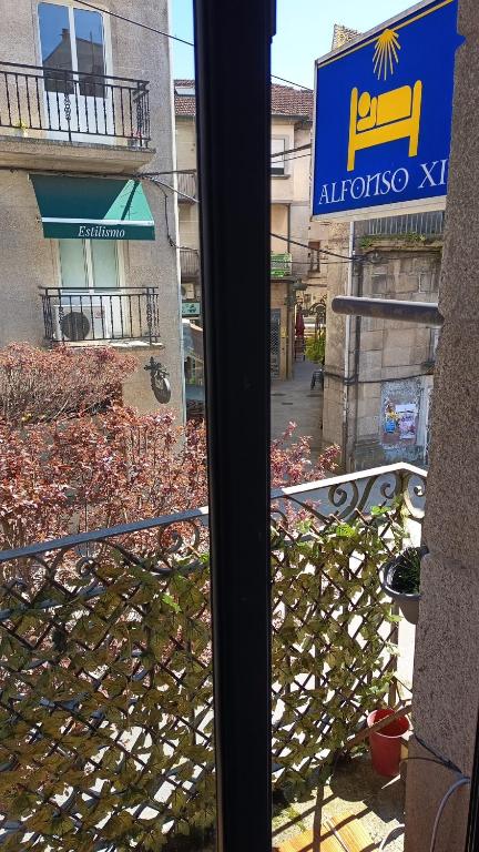 a view of a building from a window at Alfonso XII in Redondela