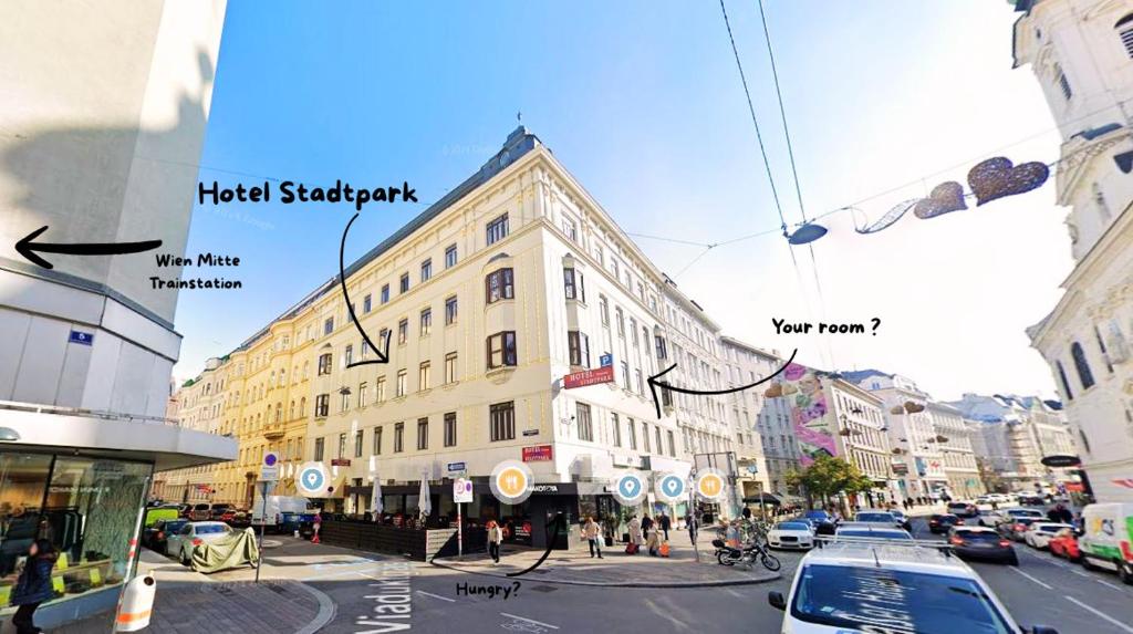 a view of a city street with a building at Hotel Stadtpark in Vienna