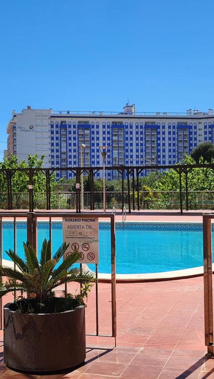 a sign in front of a swimming pool at ANIMAR piso en ALGAIDA Oropesa in Oropesa del Mar