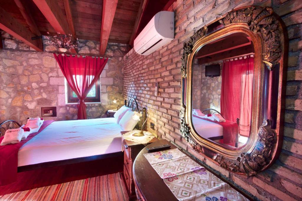 Postel nebo postele na pokoji v ubytování Pilikas Luxury Villas