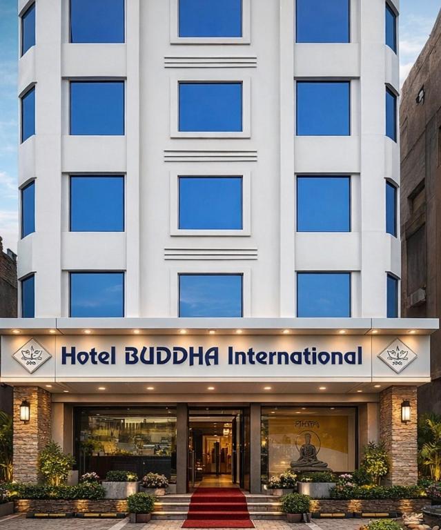 a hotel building with a hotel budida international at Hotel Buddha International in Patna