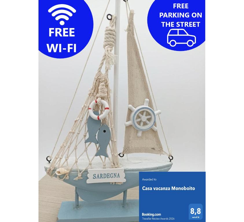 a scale model of a sailboat with a woman on a ship at Casa vacanza Monoboito in Quartu SantʼElena