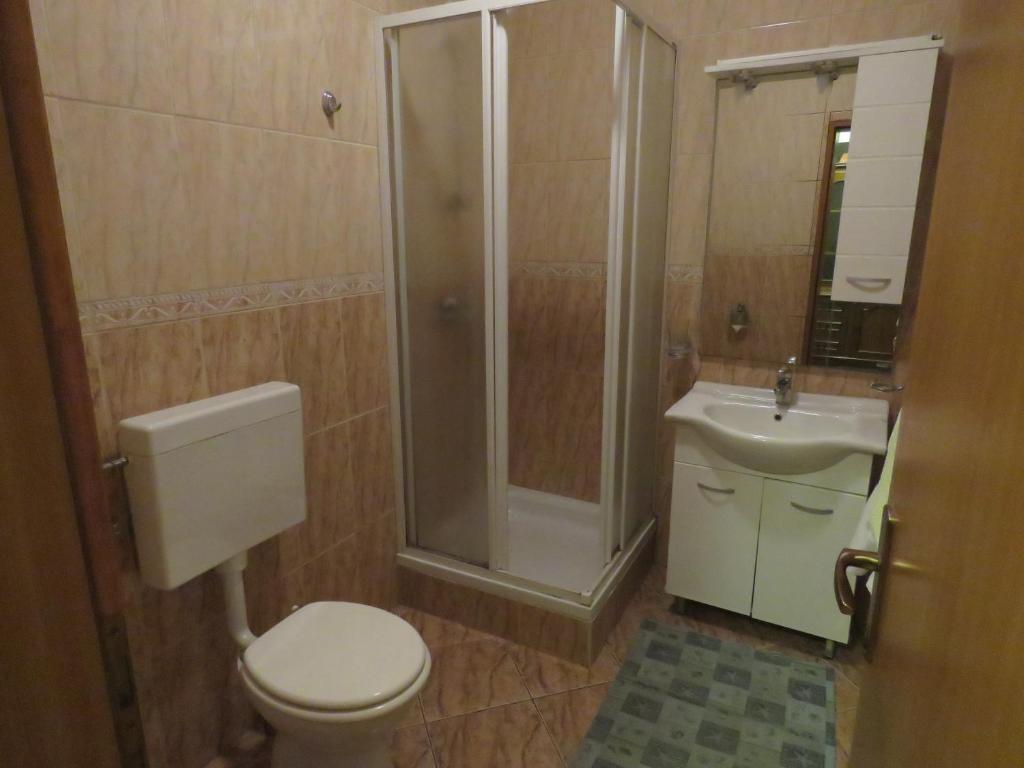Koupelna v ubytování Apartments Palma Novalja