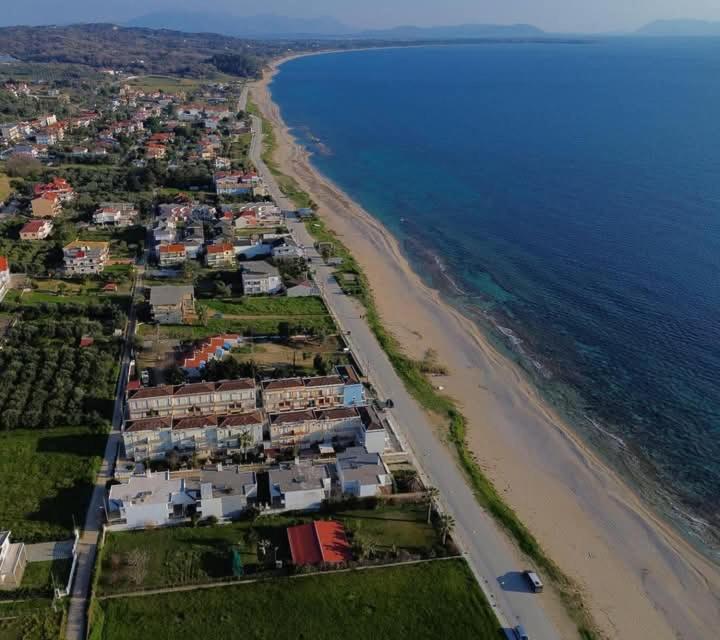 an aerial view of a beach next to the ocean at EFFIE'S VACATION by the sea in Kanali