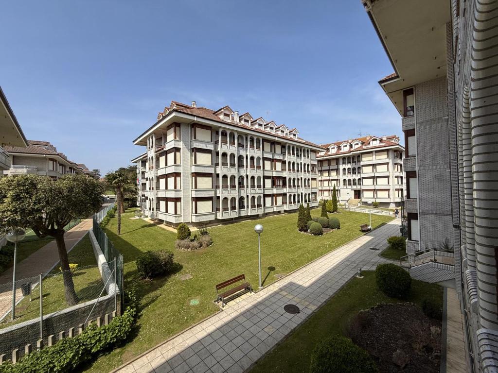 an aerial view of a building with a park at Apartamento Salceda - 6901 in Noja