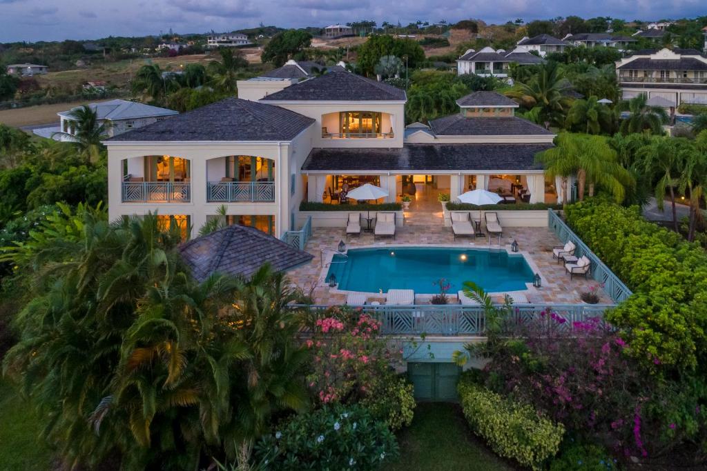 an aerial view of a house with a swimming pool at Sweet Dreams in Saint James