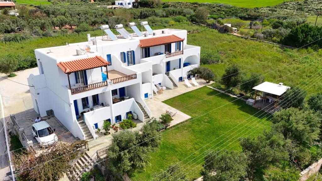 an aerial view of a white house with a yard at Ateni House in Agios Petros